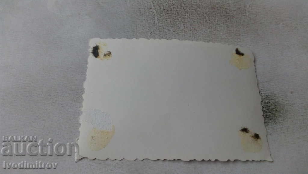 Photo Man and woman on a rock in the sea with price 1.65 BGN | € 0.84 Photo Man and woman on a rock in the sea with price 1.65 BGN | € 0.84