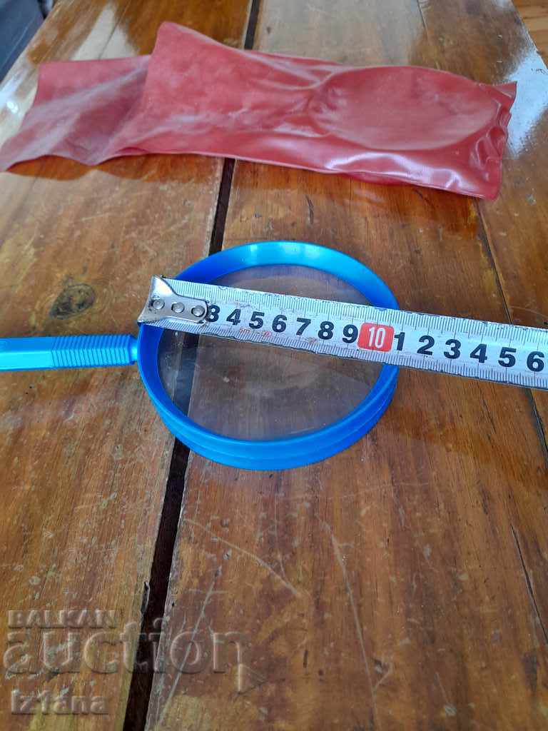 Delivery of Old magnifying glass Delivery of Old magnifying glass