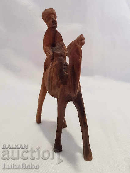 Hand-carved wooden figure of a camel with a rider. - 5 Hand-carved wooden figure of a camel with a rider. - 5