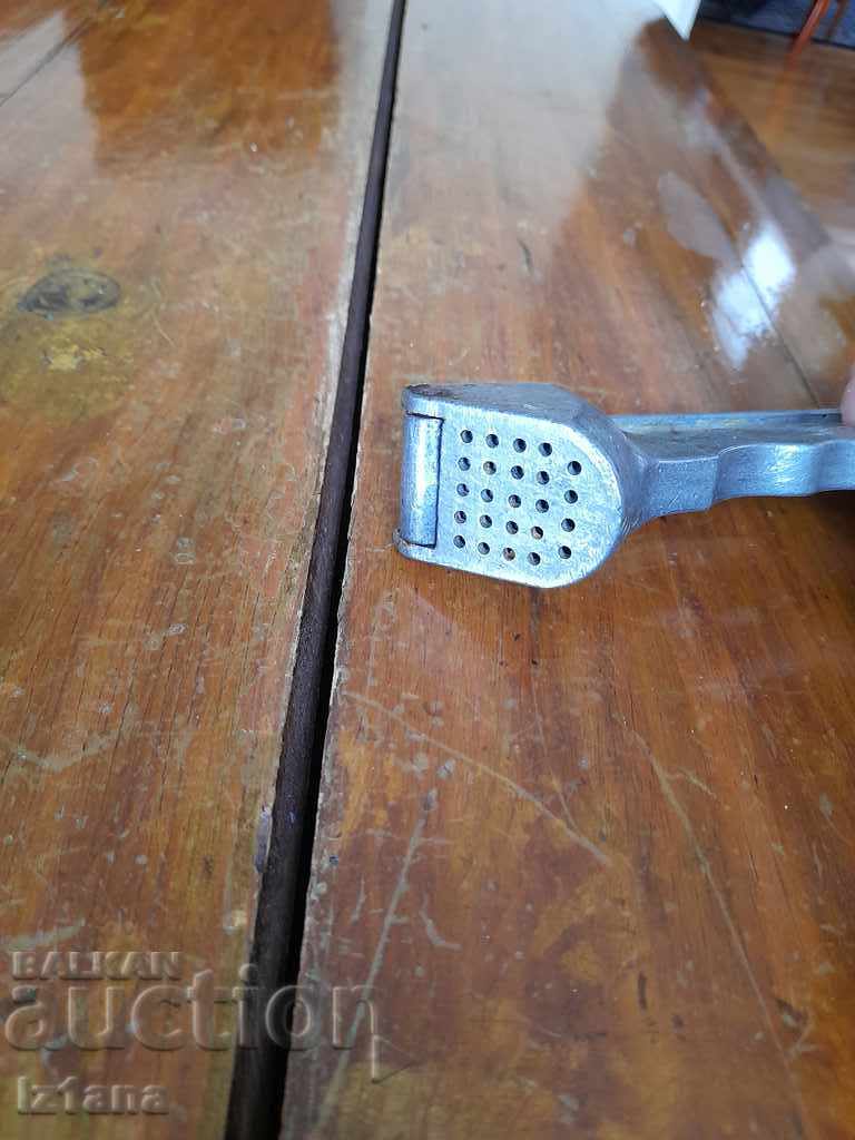 Auction  Old aluminum garlic press