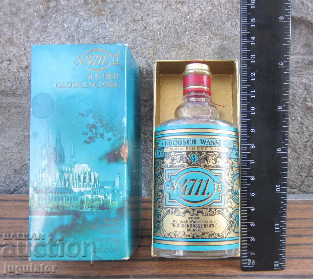 an old German glass bottle of cologne with a box with price 30.00 BGN | € 15.34 an old German glass bottle of cologne with a box with price 30.00 BGN | € 15.34