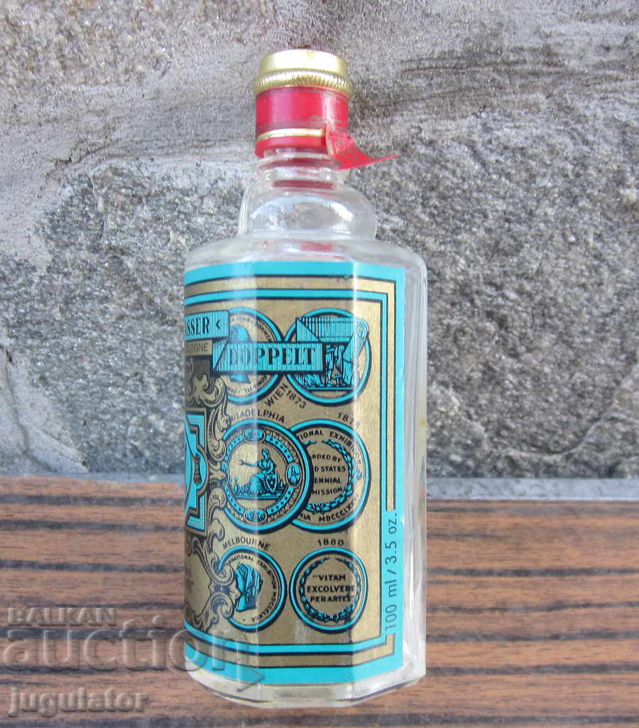 Delivery of an old German glass bottle of cologne with a box Delivery of an old German glass bottle of cologne with a box