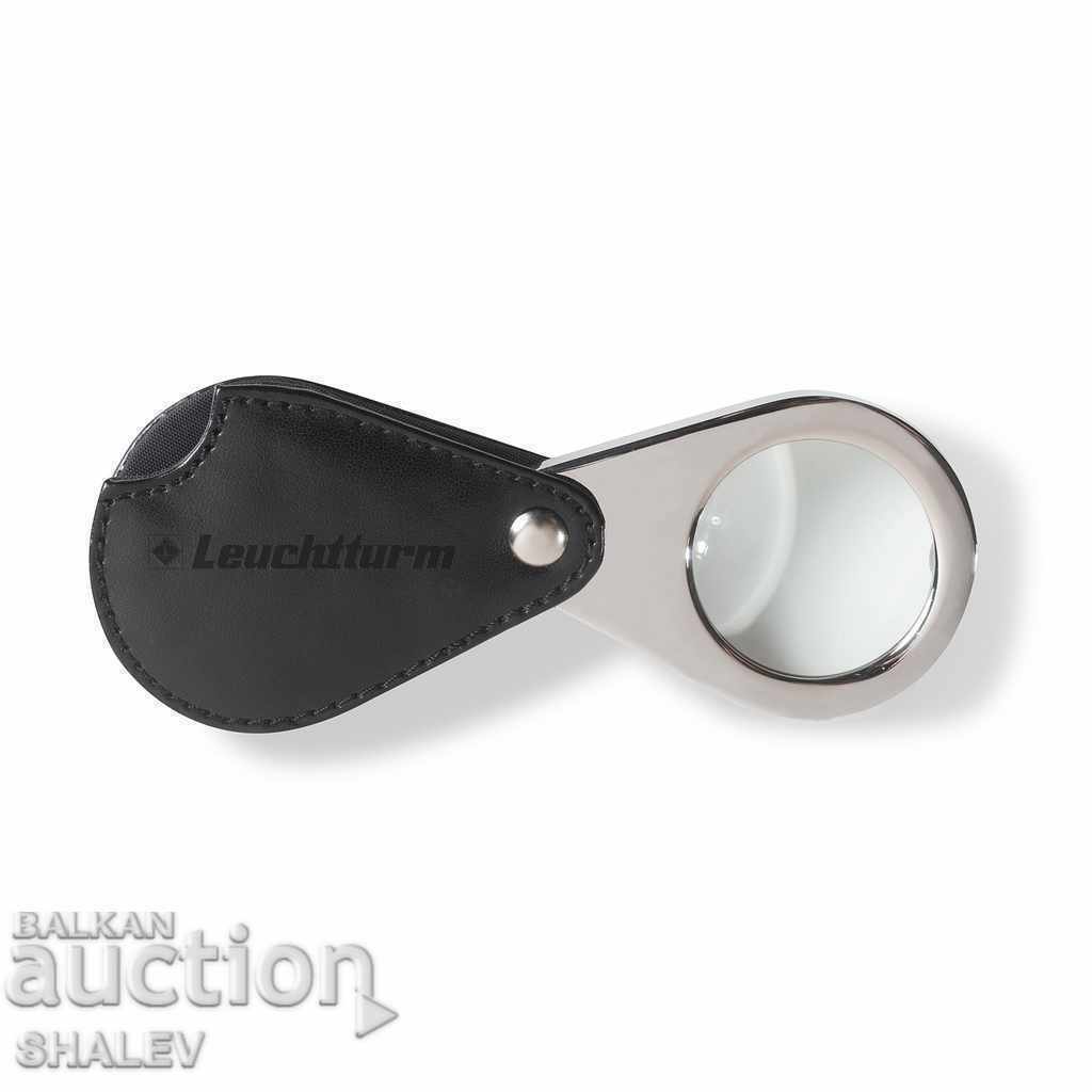 Magnifying glass "Leuchtturm" LUX 3x with leather case (1995).