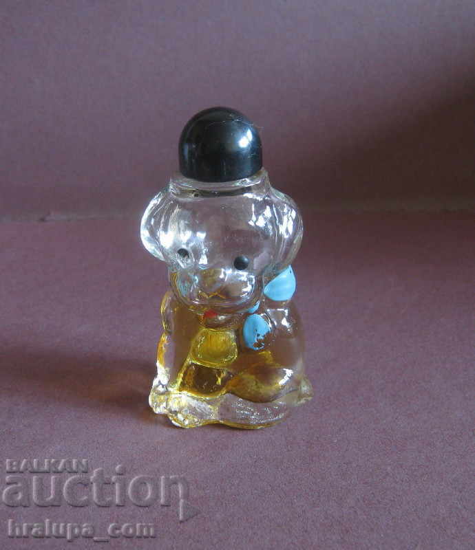 An old Russian dog perfume bottle