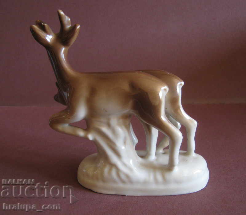 Auction Porcelain deer figure Auction Porcelain deer figure