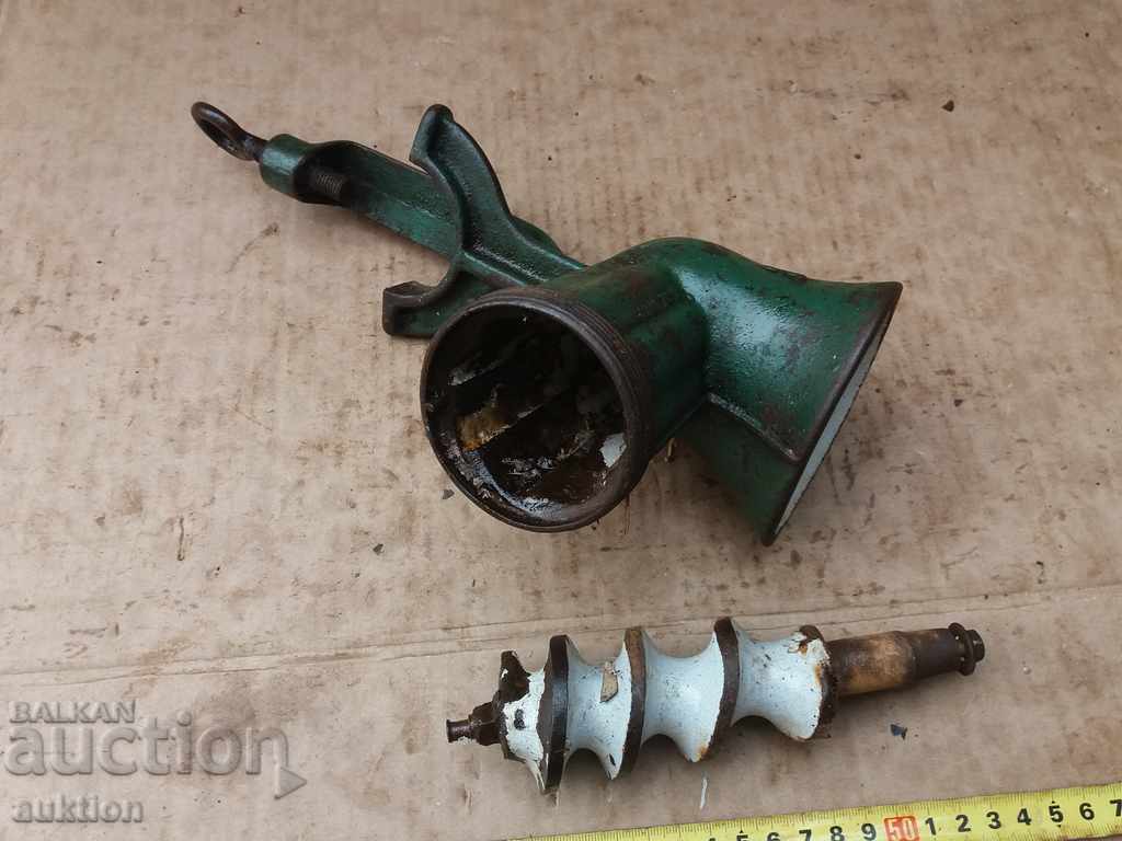 Delivery of OLD ENAMELED MEAT GRINDER Delivery of OLD ENAMELED MEAT GRINDER