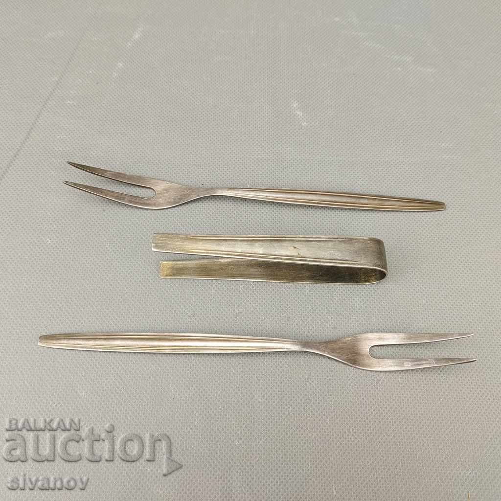 An interesting set of two silver-plated forks and a pinch №0280