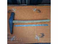 Antique wrought stone stone hammer.