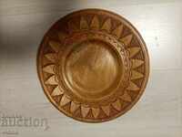 Wood carving plate with copper decoration
