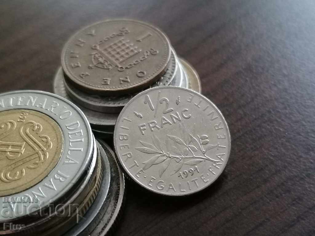 Монета - Франция - 1/2 (половин) франк | 1991г.