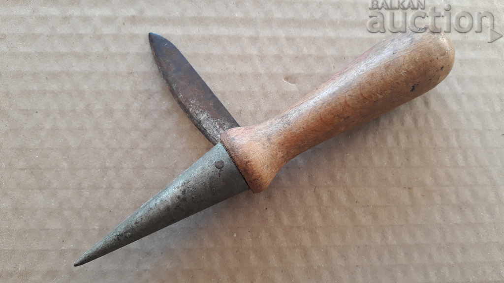 Auction  Collectible tool sharpener for cork