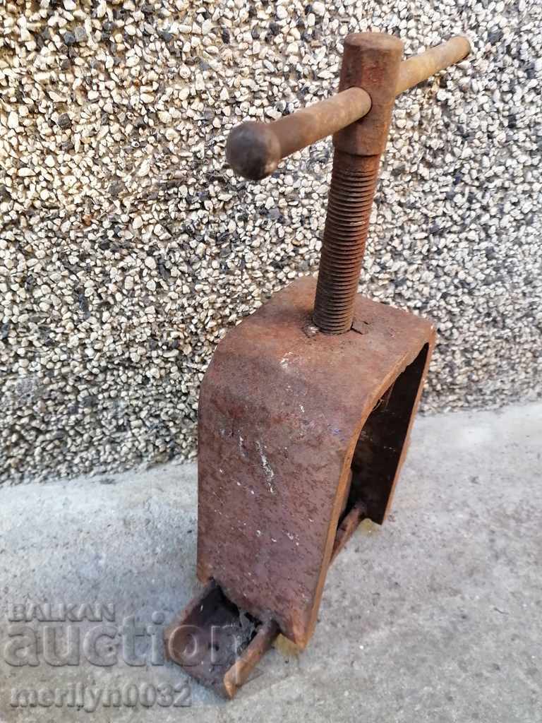 An old pipe clamp clamps an iron tool with price 60.00 BGN | € 30.68