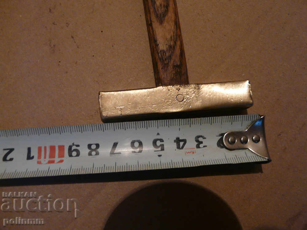 Auction A little brass hammer Auction A little brass hammer