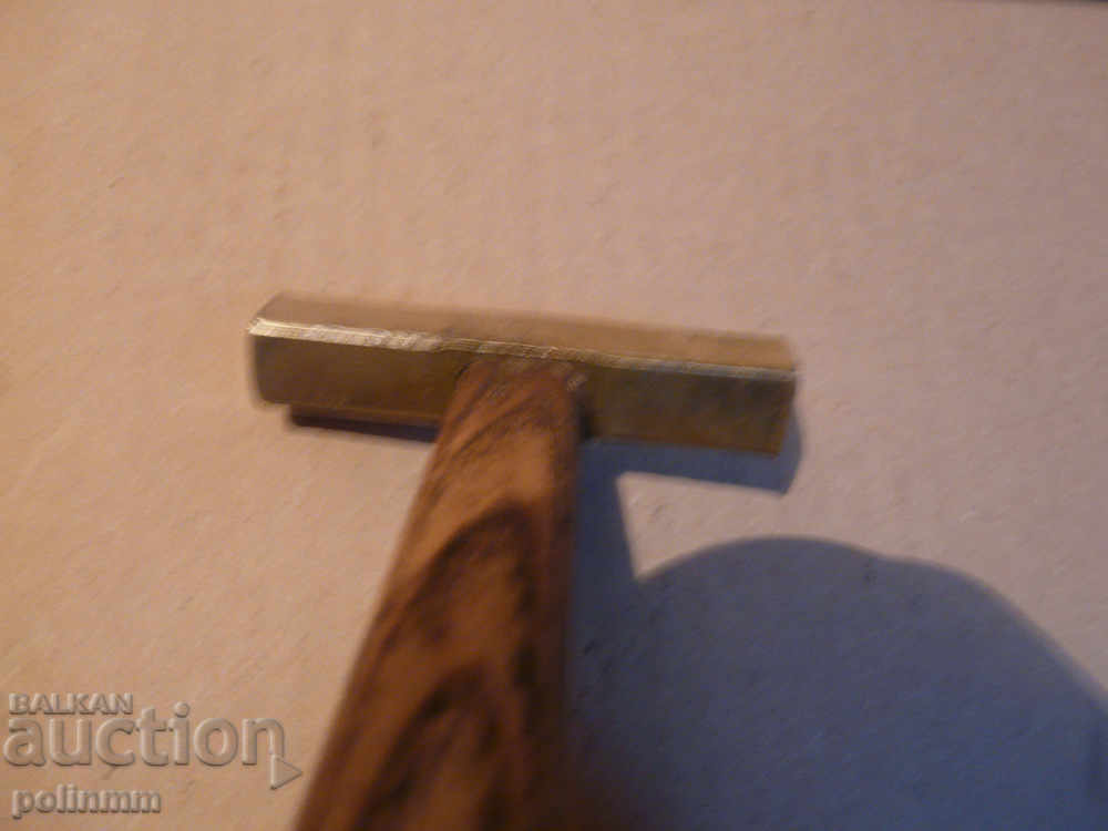 Delivery of A little brass hammer Delivery of A little brass hammer