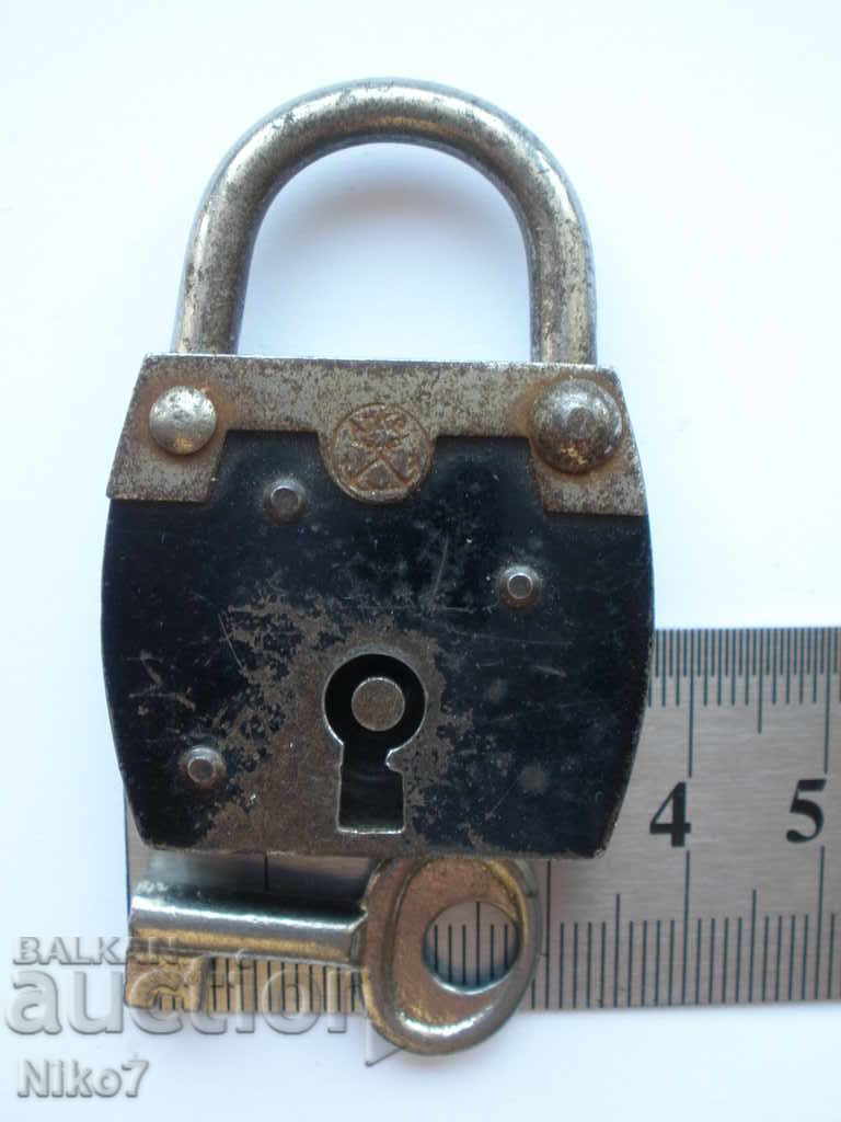 Old padlock with key. - 5