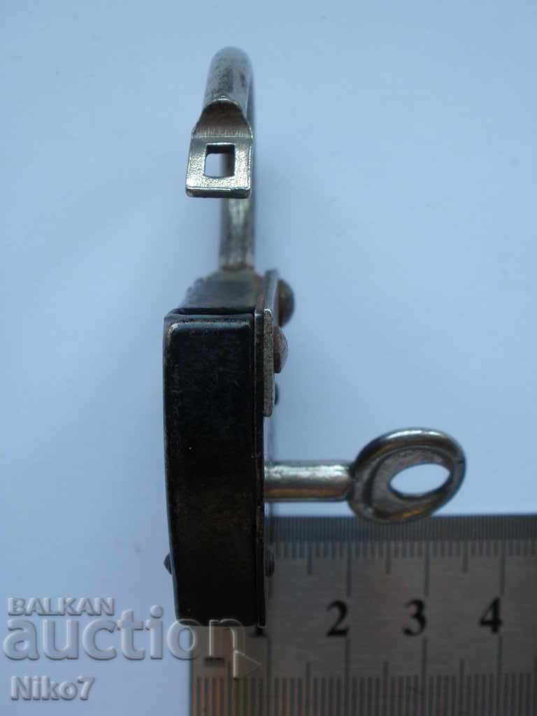 Old padlock with key. - 6