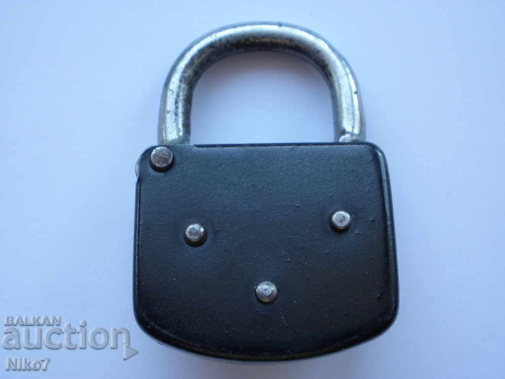 Auction An old, German padlock with a key. Auction An old, German padlock with a key.