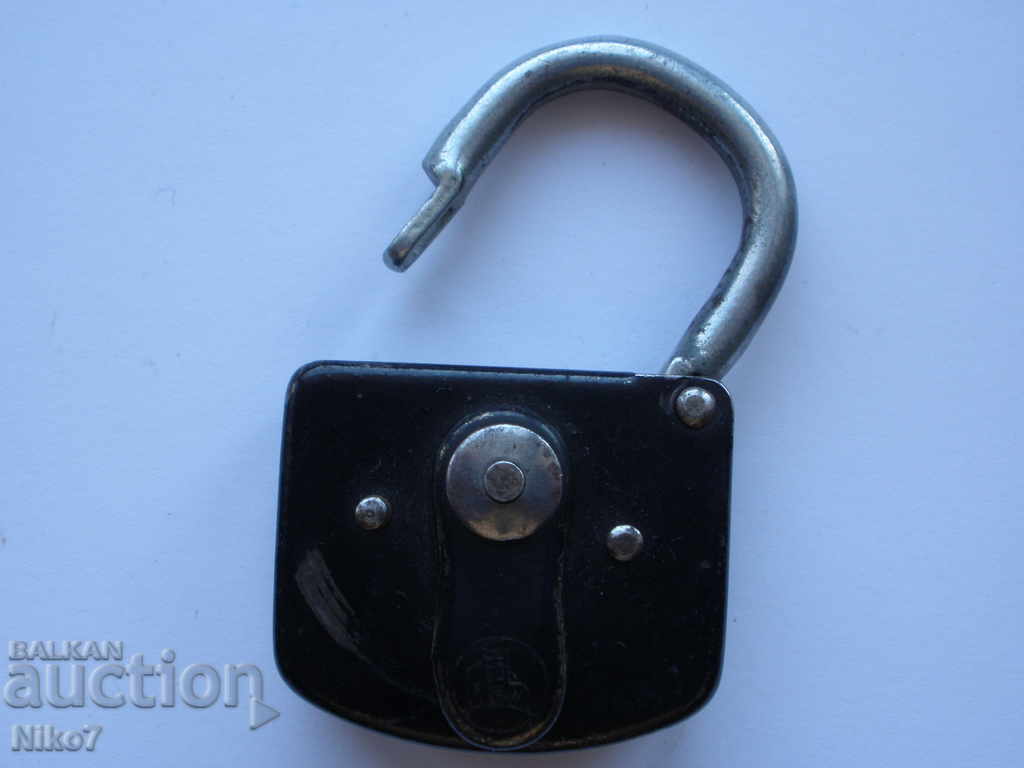 Delivery of An old, German padlock with a key. Delivery of An old, German padlock with a key.
