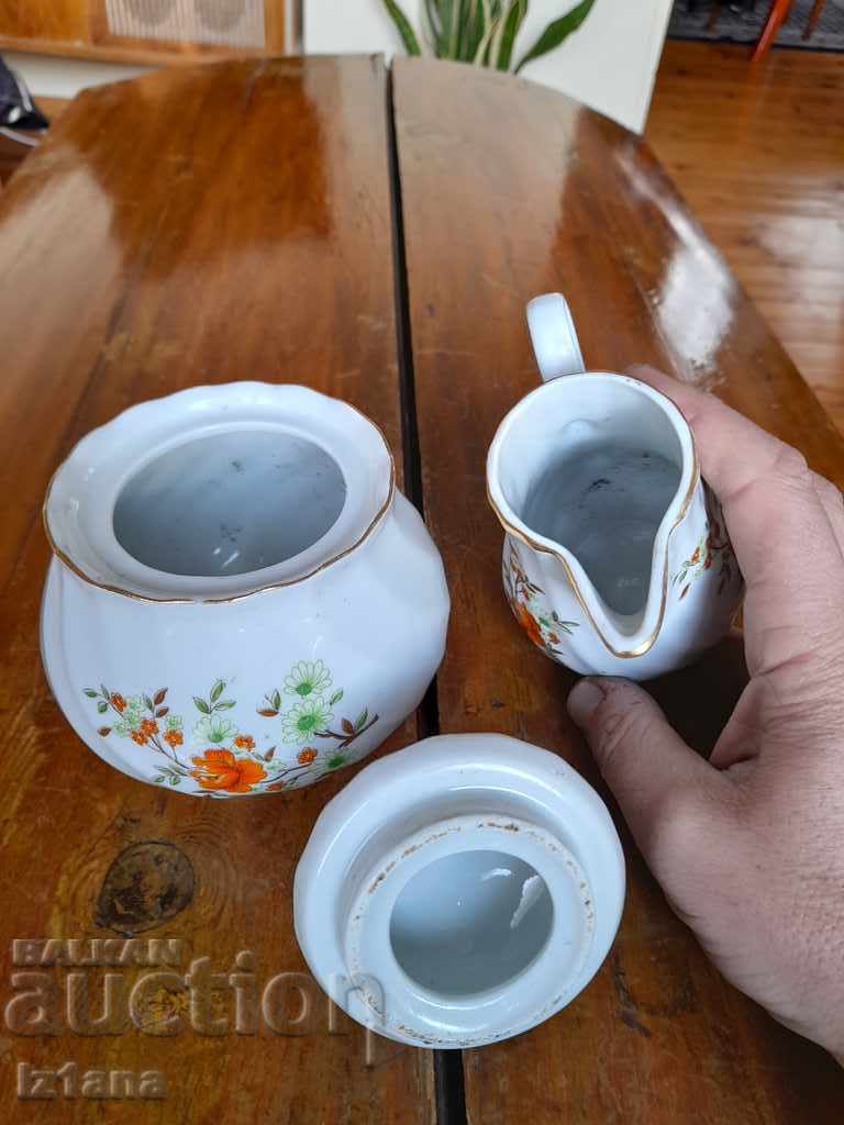 Delivery of Old set of porcelain sugar bowl and jug Delivery of Old set of porcelain sugar bowl and jug