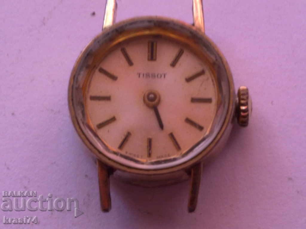 Gilded Tissot watch