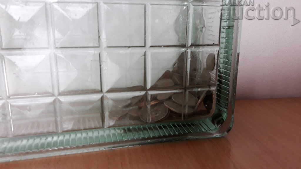 Auction  lot lot soc coins in a glass brick money box