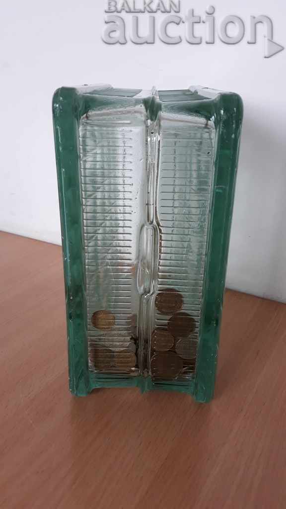 Delivery of lot lot soc coins in a glass brick money box