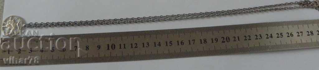 Auction  Silver pendant with a chain
