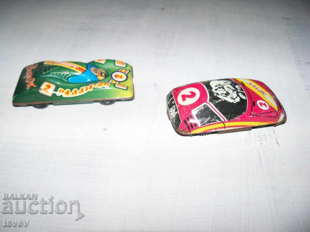 Delivery of Two small tin carts, social toys Delivery of Two small tin carts, social toys