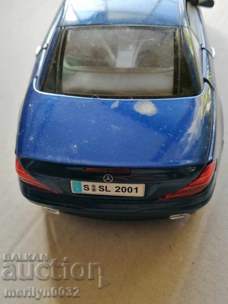 Auction A toy, a car, a stroller, a truck Auction A toy, a car, a stroller, a truck