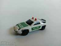 METAL CHILDREN'S TOY POLICE CAR IRON TROLLEY