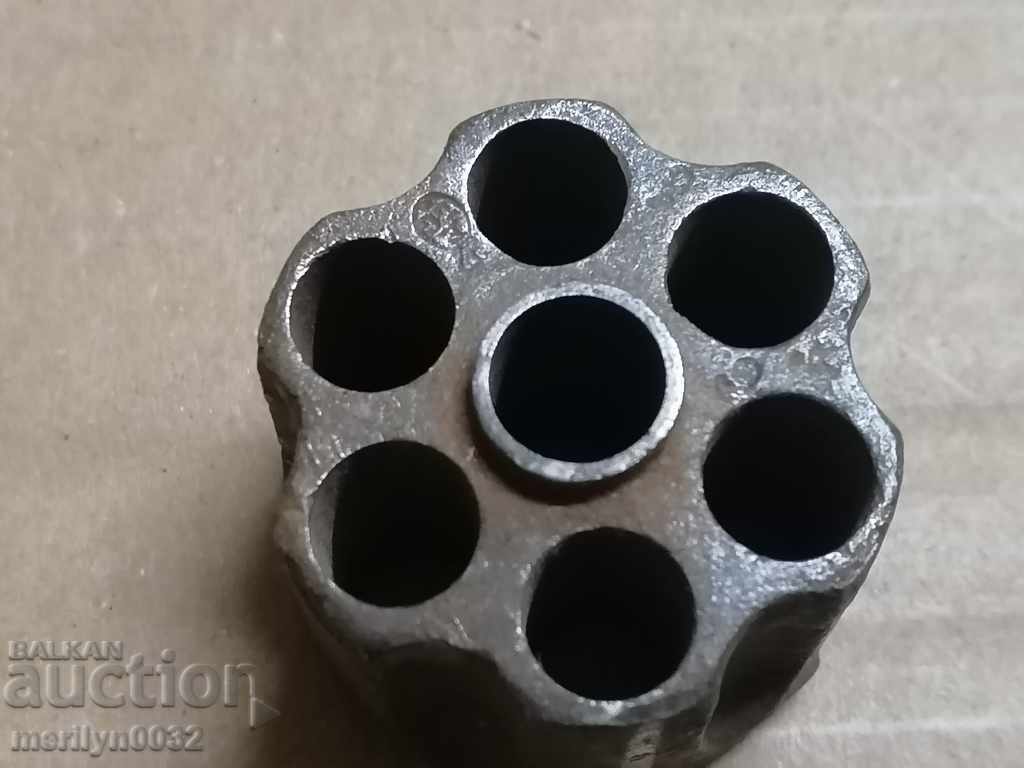 Six charged drums from a breakable revolver Six charged drums from a breakable revolver