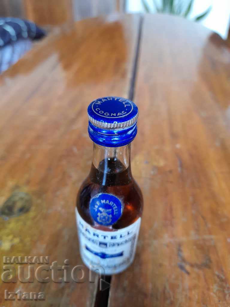 Delivery of An old bottle of Martell Delivery of An old bottle of Martell