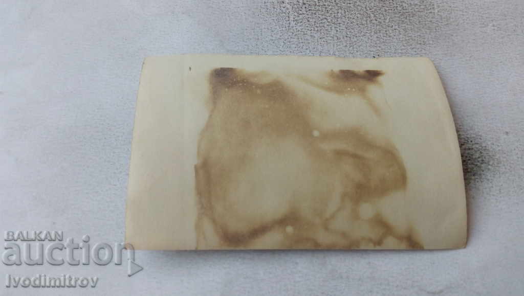 Photo Man in shorts with his son next to a water pump with price 1.65 BGN | € 0.84 Photo Man in shorts with his son next to a water pump with price 1.65 BGN | € 0.84