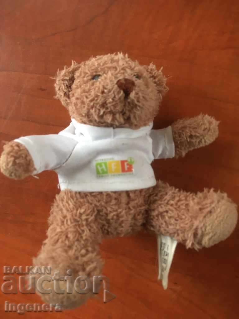 Auction A BEAR DOLL OR ANOTHER TOY FIGURE Auction A BEAR DOLL OR ANOTHER TOY FIGURE