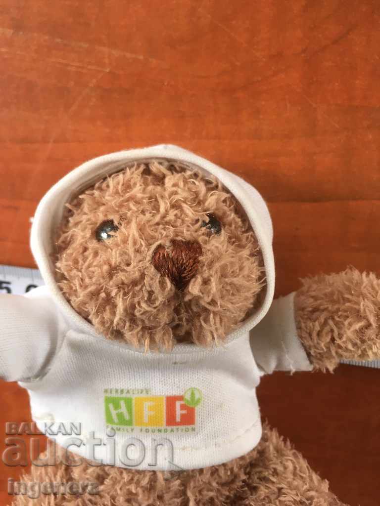 A BEAR DOLL OR ANOTHER TOY FIGURE - 5 A BEAR DOLL OR ANOTHER TOY FIGURE - 5
