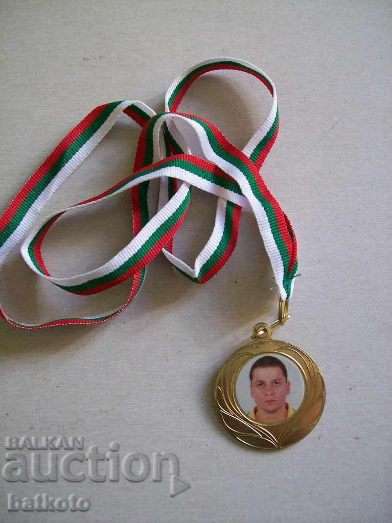 Gold sports medal with price 10.00 BGN | € 5.11 Gold sports medal with price 10.00 BGN | € 5.11