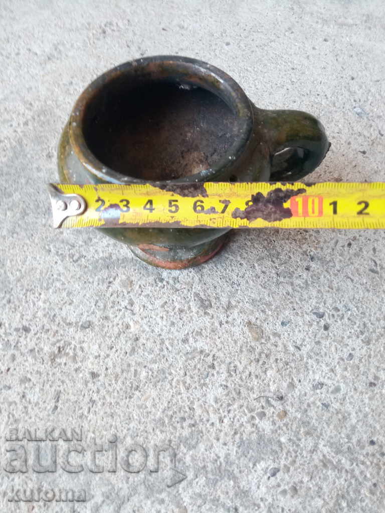 An old ceramic candela with price 14.99 BGN | € 7.66 An old ceramic candela with price 14.99 BGN | € 7.66