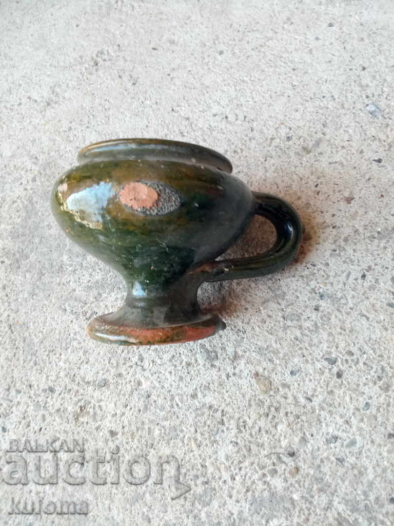 Auction An old ceramic candela Auction An old ceramic candela