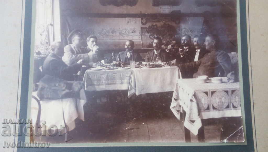 Photo Men at the table in the Cardboard restaurant with price 12.65 BGN | € 6.47