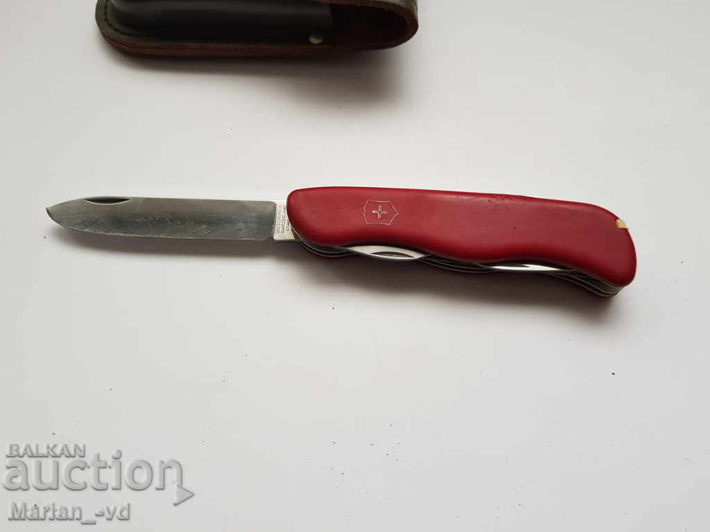 Auction Swiss Victorinox pocket military knife with case Auction Swiss Victorinox pocket military knife with case