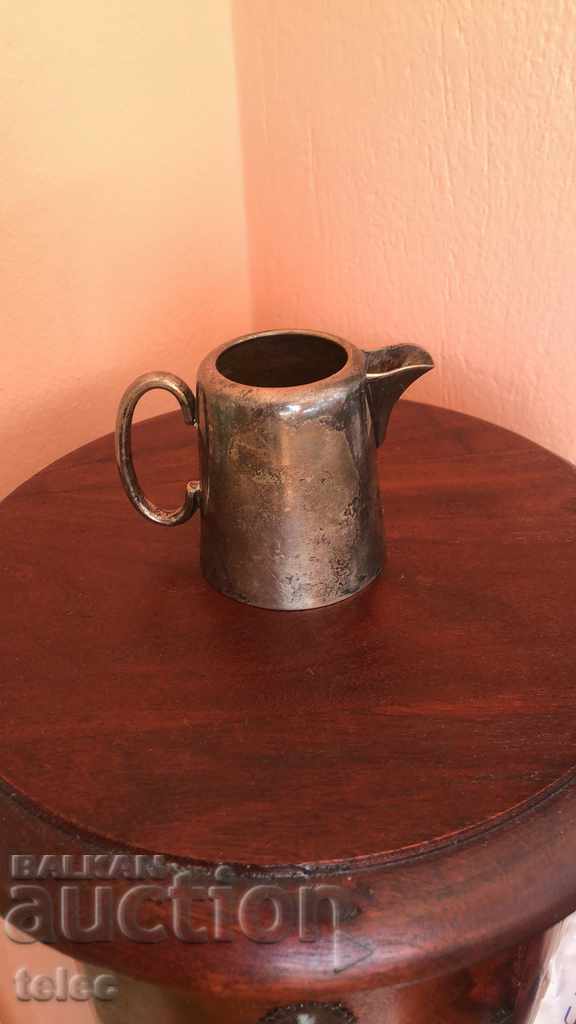 Old English jug with silver coating