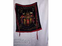 Apron with coat of arms