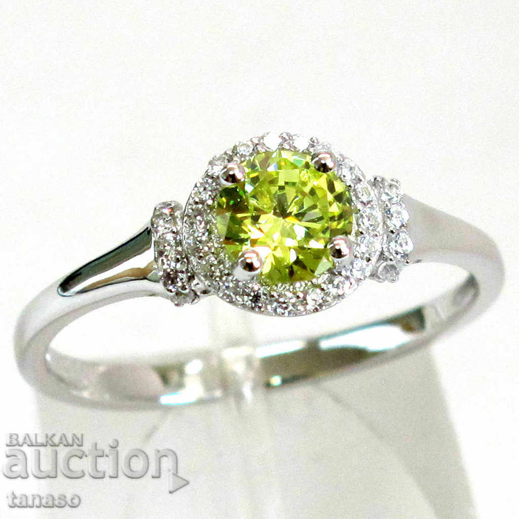 Delicate ring with faceted round peridot