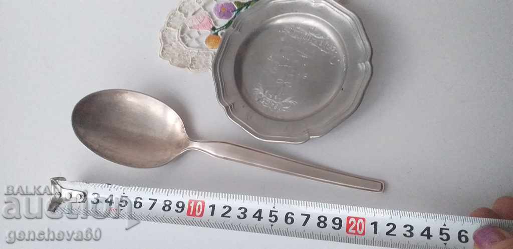 Old silver plated serving spoon with plate