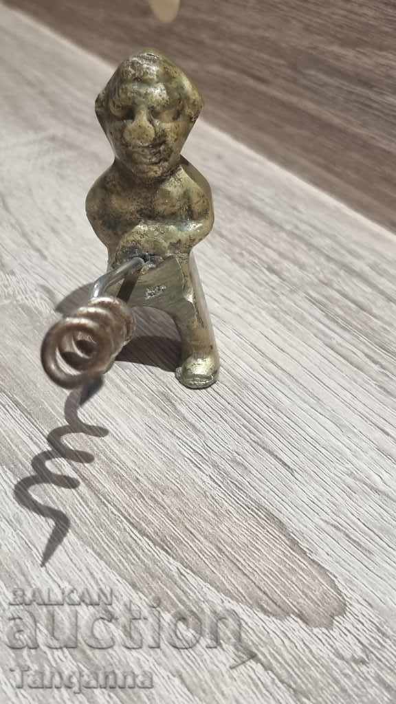 Auction Bronze wine opener Auction Bronze wine opener