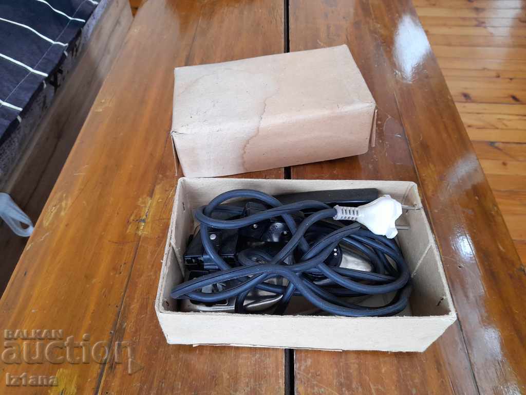 Old electric iron with price 33.00 BGN | € 16.87 Old electric iron with price 33.00 BGN | € 16.87