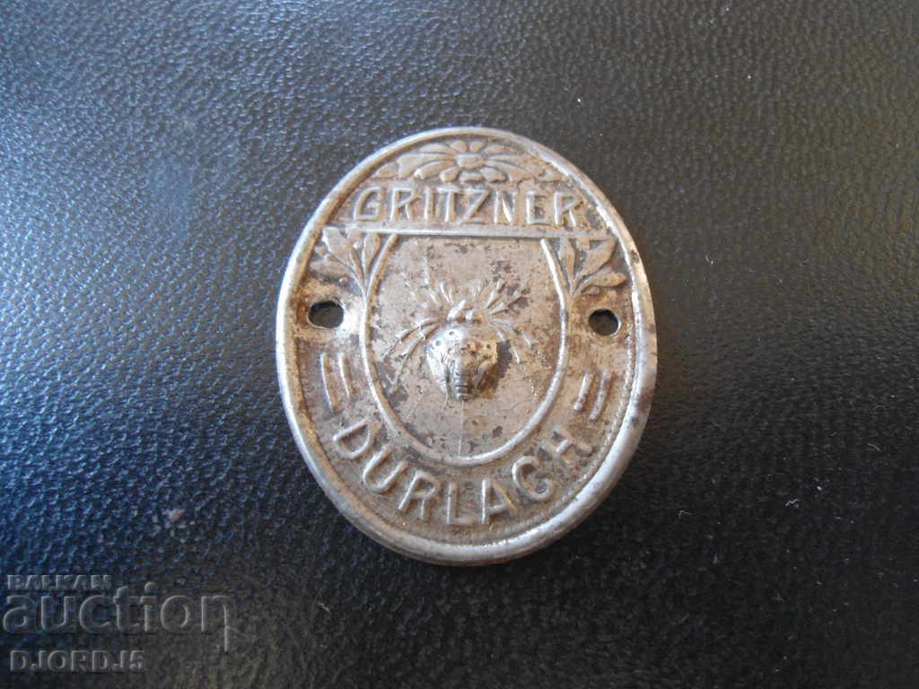Emblema de la o mașină de cusut veche „GRITZNER”