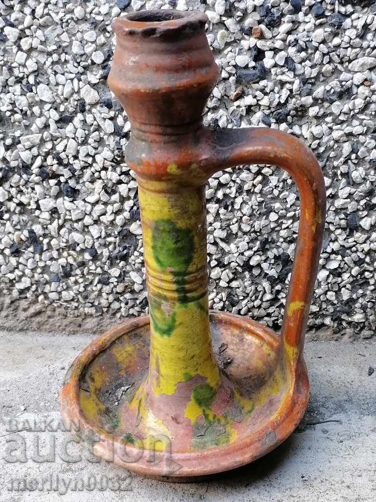 Old ceramic candlestick candle