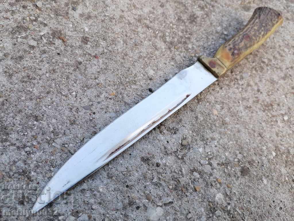 Old hunting knife with antler handle Old hunting knife with antler handle