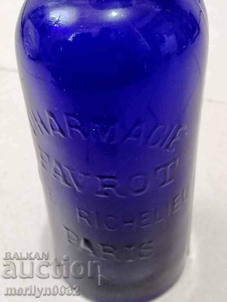 Το φυσητό μπουκάλι του παλιού φαρμακοποιού από γαλλικό μπλε γυαλί Παρίσι